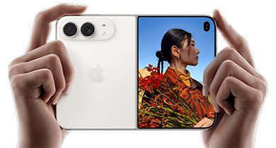 to hender som holder nye iphone duo i stjernehvit