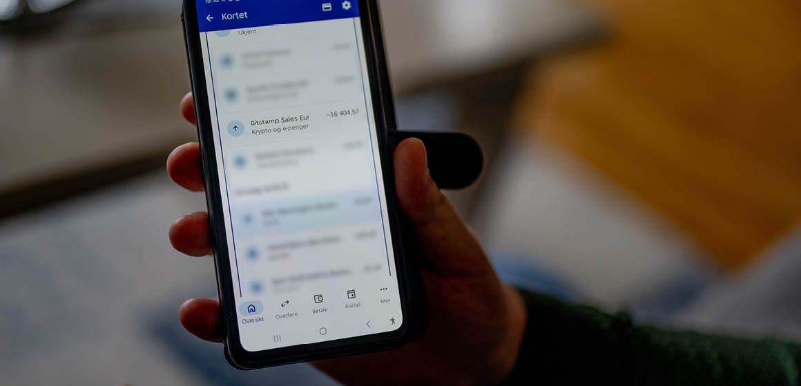 Mobilskjerm med transaksjoner