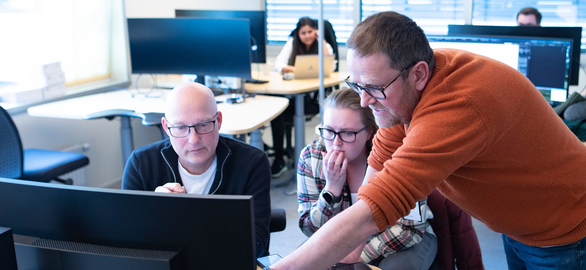 Software engineers og utviklere på jobb i Telenor